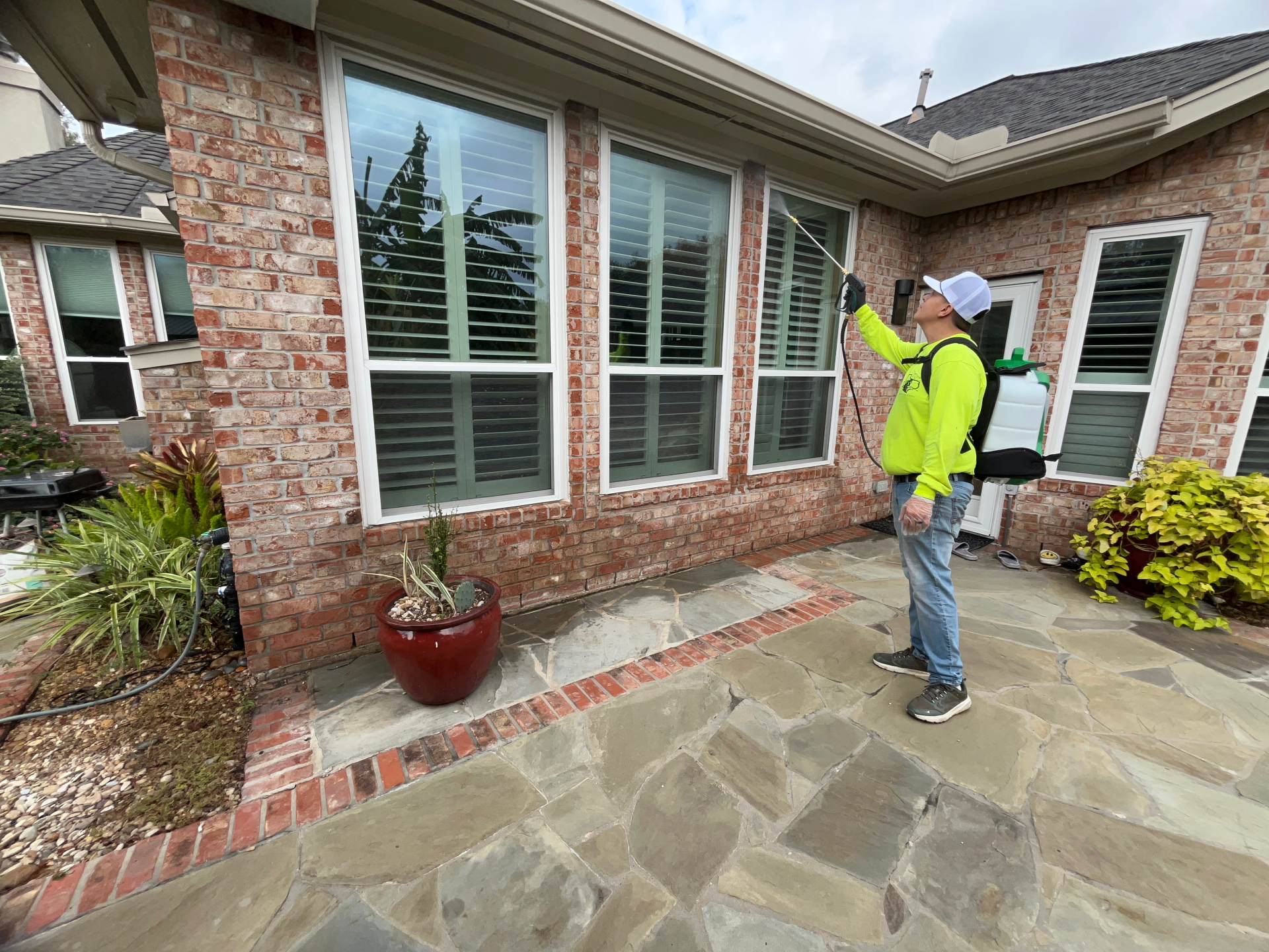 Adrian Martinez performing pest control treatment